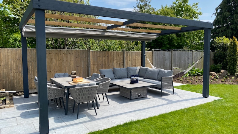 Modern pergola with retractable waterproof shade open